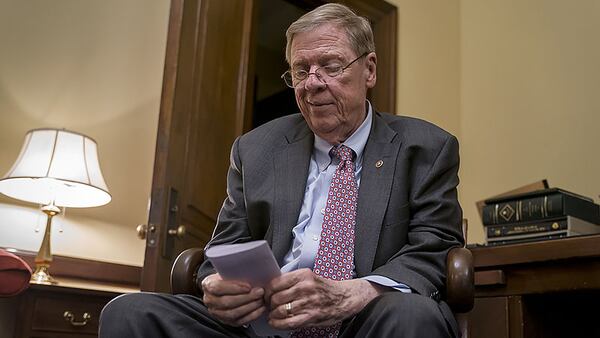 U.S. Sen. Johnny Isakson, R-Ga., meets with his staff in his Capitol Hill office on Dec. 2, 2019, as he prepares to deliver his farewell address on the floor of the Senate. (AP Photo/J. Scott Applewhite)