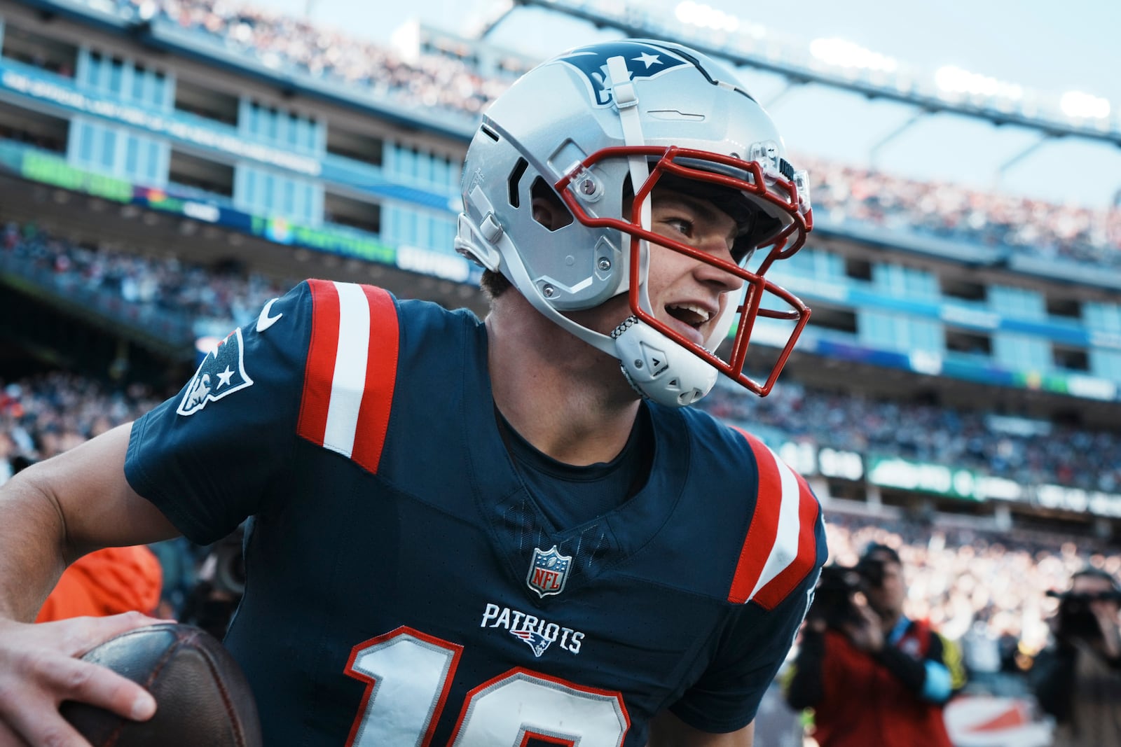 New England Patriots quarterback Drake Maye celebrates after running for a touchdown in the first half of an NFL football game against the New York Jets, Sunday, Oct. 27, 2024, in Foxborough, Mass. (AP Photo/Michael Dwyer)