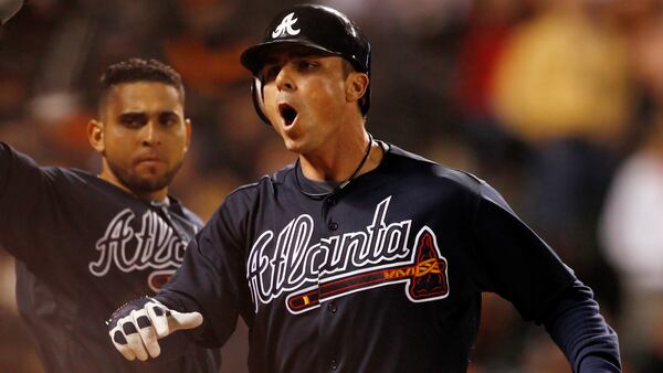 Rick Ankiel celebrates after crossing home plate on his solo, game-winning home run in the top of the 11th inning in Game 2 of the NL Division Series against the San Francisco Giants Friday, Oct. 8, 2010.