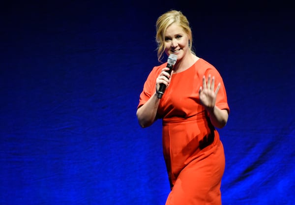 July 24: Amy Schumer, wrote and stars in the romantic comedy "Trainwreck," directed by Judd Apatow. (Photo by Chris Pizzello/Invision/AP)