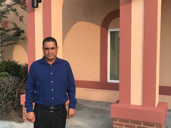 Pastor Carlos Ceja stands in front of his church, Manantial de Vida, in Valdosta on Saturday, August 19, 2023.