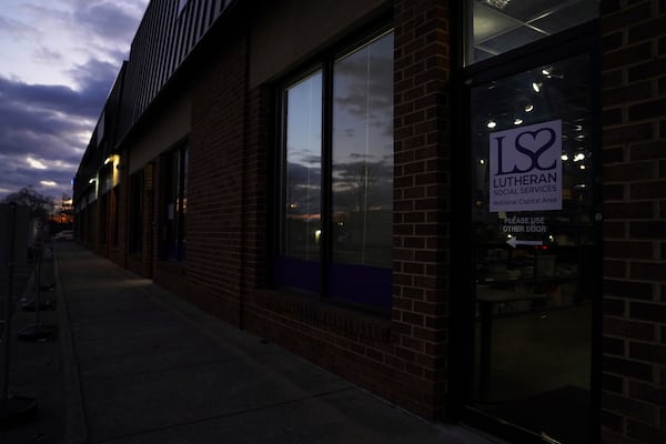 The sun sets beyond the Lutheran Social Services National Capital Area Resource Center in Alexandria, Va., Thursday, March 6, 2025. (AP Photo/Jessie Wardarski)