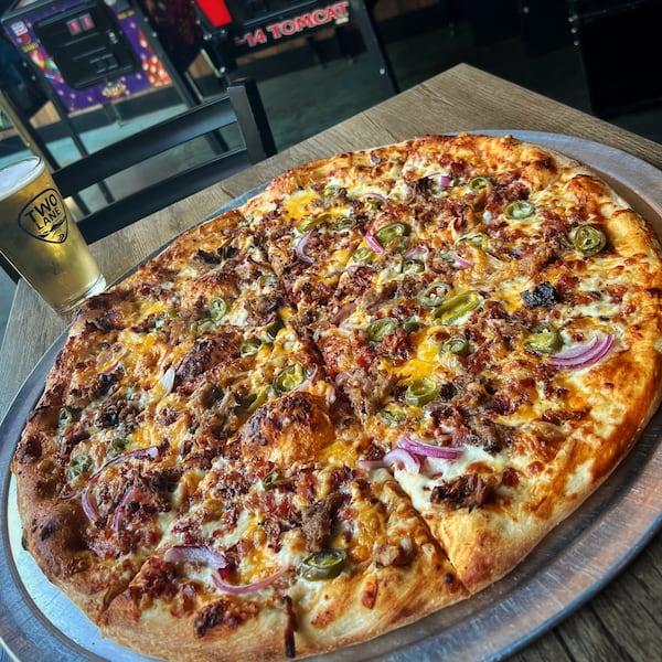 Jag's Pizzeria and Pub offers a bacon and pulled pork pizza with a barbecue-sauce base. Courtesy of Visit Macon