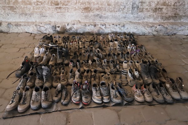 This photo released by the Jalisco State Attorney General's Office shows shoes at the Izaguirre Ranch where skeletal remains were also discovered in the municipality of Teuchitlan, Mexico, Tuesday, March 11, 2025. (Jalisco State Attorney General's Office via AP)