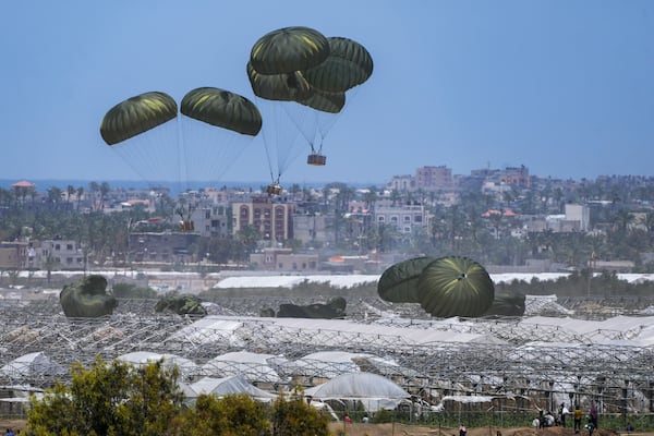 FILE - An aircraft airdrops humanitarian aid over Khan Younis, Gaza Strip, Thursday, May 30, 2024. (AP Photo/Abdel Kareem Hana, File)