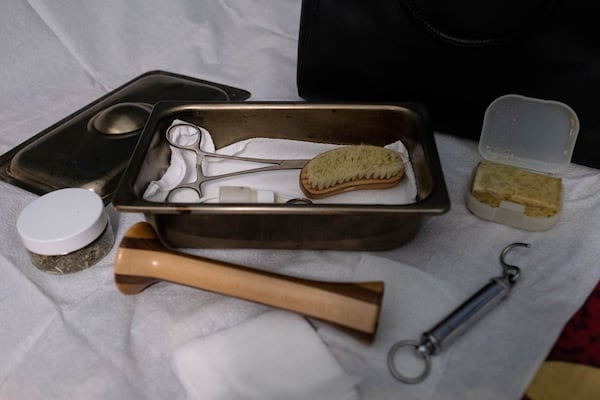 Atlanta-based Sarahn Henderson has been a midwife for 41 years and has extensively researched the history of Black midwives in the South. She has a collection of tools used by midwives during the early and mid-1900s. (Ben Gray for The Atlanta Journal-Constitution)