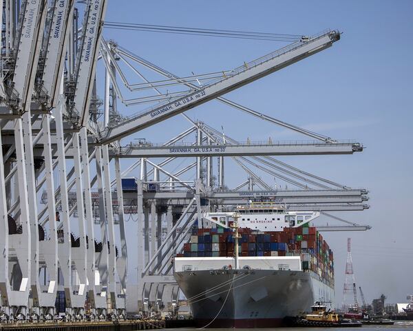 In this photo provided by the Georgia Port Authority, Georgia Ports Authority, neo-panamax ship to shore cranes start work on the container ship Cosco Development at the Port of Savannah, Thursday, May 11, 2017, in Garden City, Ga. (AP Photo/Georgia Port Authority, Stephen Morton)