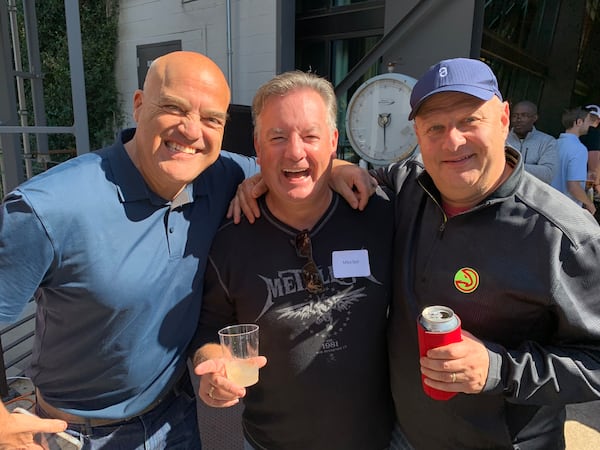 Former 790/The Zone owners Steak Shapiro (left) and Andrew Saltzman (right) sandwiched between former Zone host Mike Bell. Shapiro and Bell now work at 92.9/The Game. Saltzman works with the Atlanta Hawks. RODNEY HO/rho@ajc.com