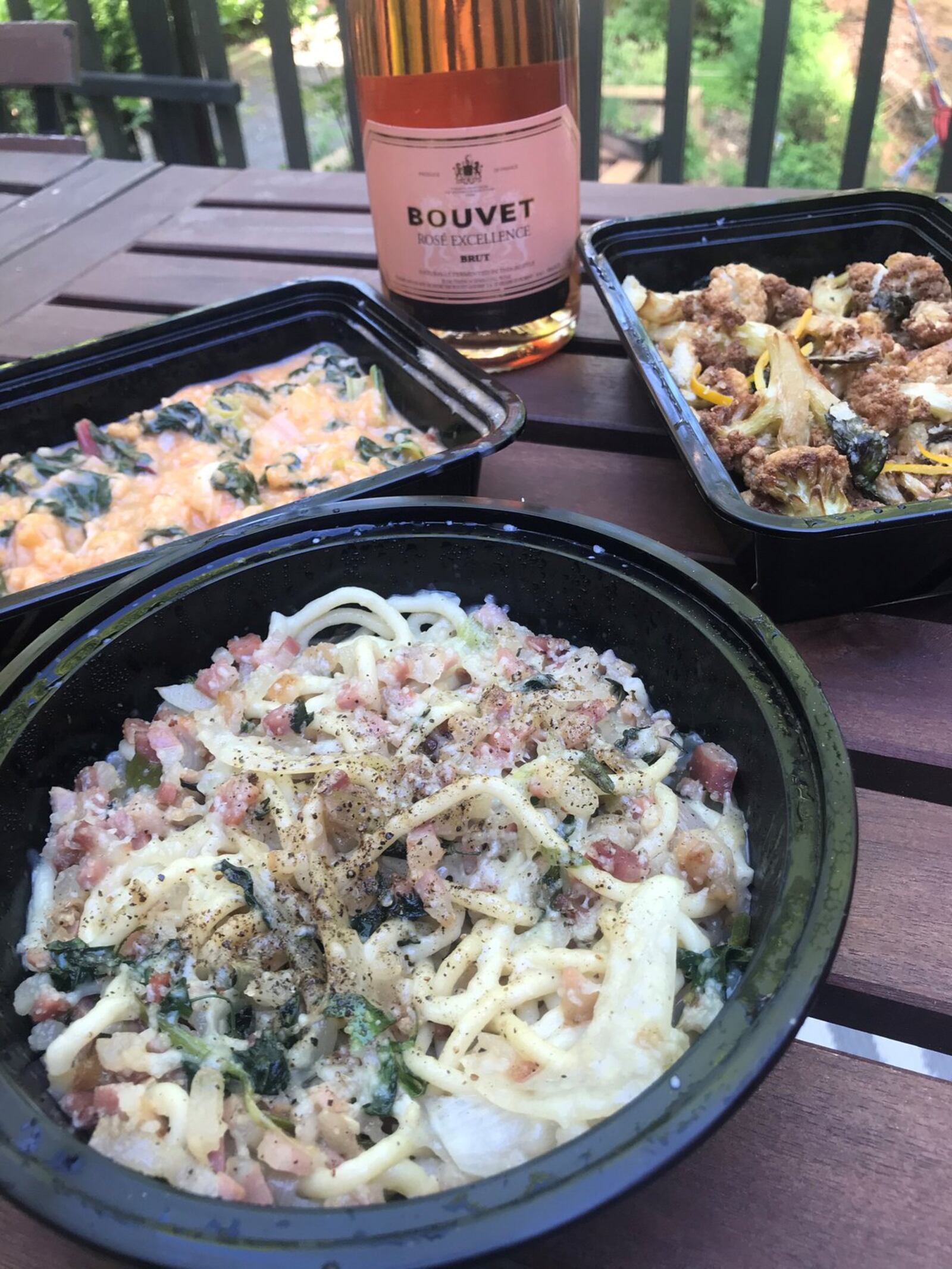 The menu changes daily at BoccaLupo in Inman Park. Pictured, from top right: Roman fried cauliflower, bucatini alla gricia, and Georgia shrimp and spring vegetable risotto. Need a wine pairing? The staff is highly versed on its selection. Ask for recommendations. LIGAYA FIGUERAS / LIGAYA.FIGUERAS@AJC.COM