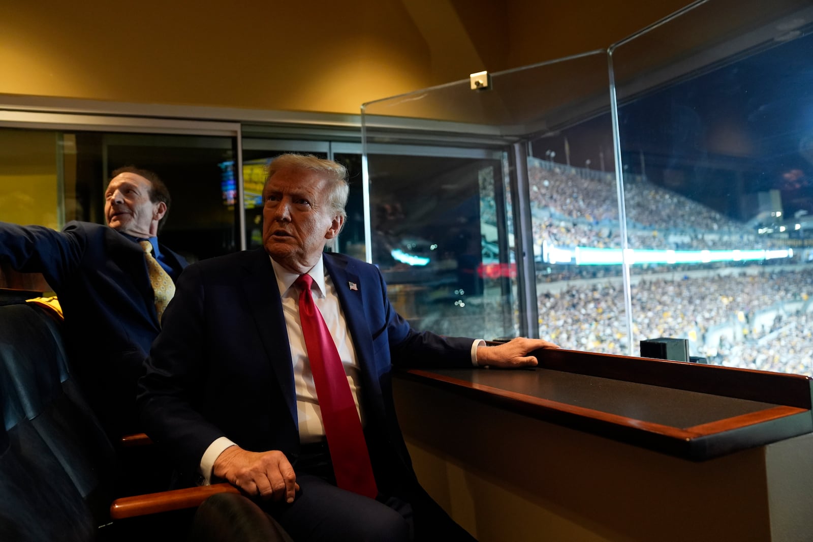 Republican presidential nominee former President Donald Trump attends the New York Jets football game against the Pittsburgh Steelers at Acrisure Stadium, Sunday, Oct. 20, 2024, in Pittsburgh. (AP Photo/Evan Vucci)