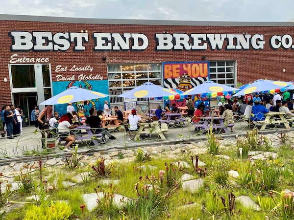 Best End Brewing’s patio is adjacent to the Beltline and is framed by a native bog garden maintained by Trees Atlanta. (Wendell Brock for The Atlanta Journal-Constitution)