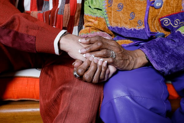 Morocco and Paula Coleman hold hands showing the love they have shared for decades. Miguel Martinez / miguel.martinezjimenez@ajc.com