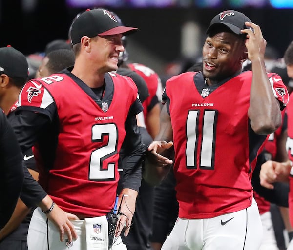 August 31, 2017 Atlanta: Falcons quarterback Matt Ryan and wide reciever Julio Jones, who both did not play in the game, share a laugh on the sidelines during the 4th quarter of their final preseason game against the Jaguars in a NFL football game on Thursday, August 31, 2017, in Atlanta.    Curtis Compton/ccompton@ajc.com