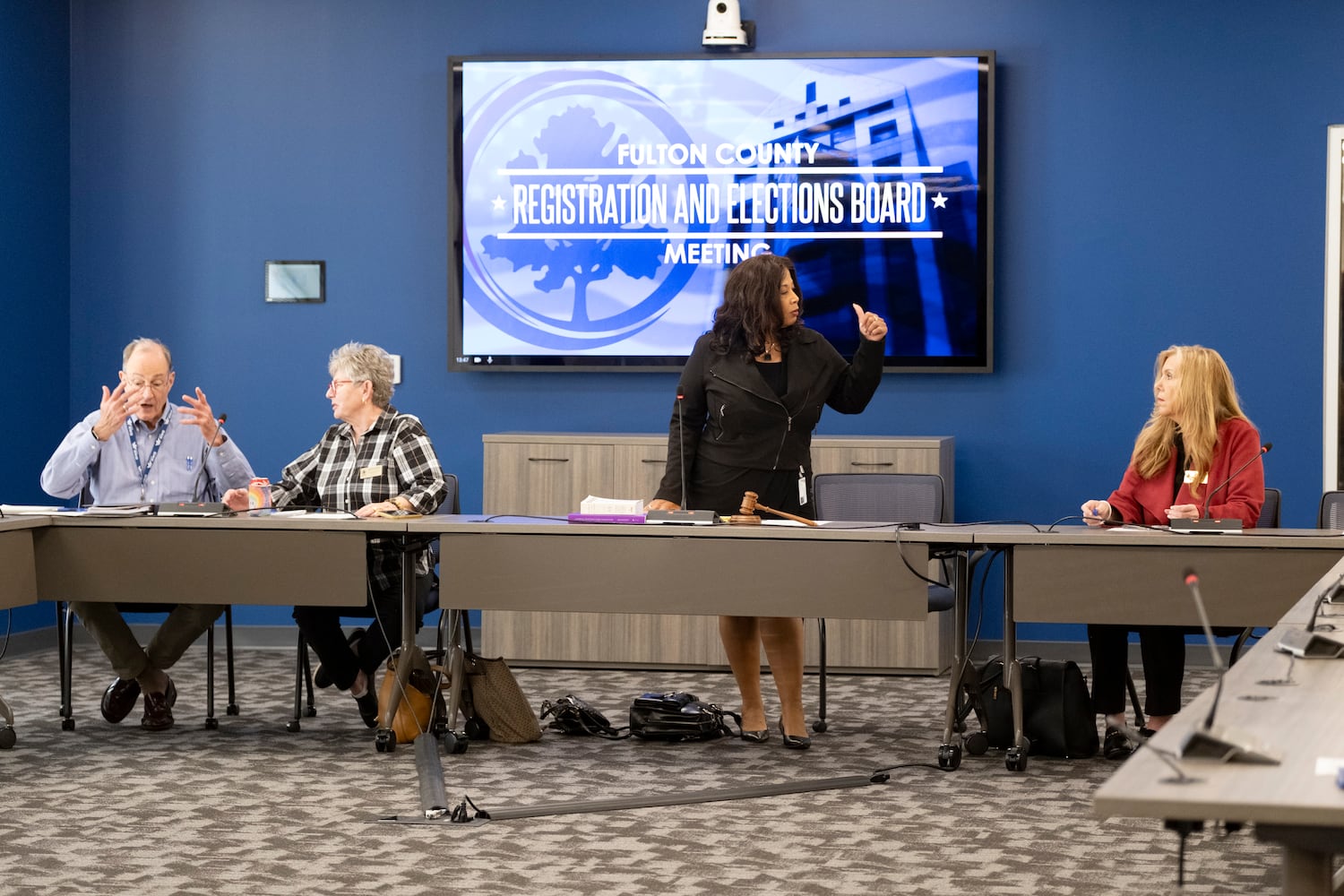 The Fulton County Registration and Elections Board prepares to convene for a special called meeting to hear voter registration challenges at the Fulton County election hub in Fairburn on Tuesday, Nov. 5, 2024.   Ben Gray for the Atlanta Journal-Constitution