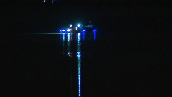 Crews from the Georgia Department of Natural Resources and the Forsyth County Fire Department searched for the missing boater for more than six hours Monday. (Credit: Channel 2 Action News)