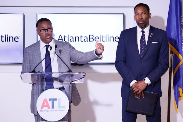 Atlanta Beltline CEO Clyde Higgs stands alongside Atlanta Mayor Andre Dickens at a press conference on Thursday, November 7, 2024. During the event, they announced the acquisition of the land for the Elleven45 Lounge, marking the beginning of the Segment 2 trail in the Buckhead Northwest area.
(Miguel Martinez / AJC)