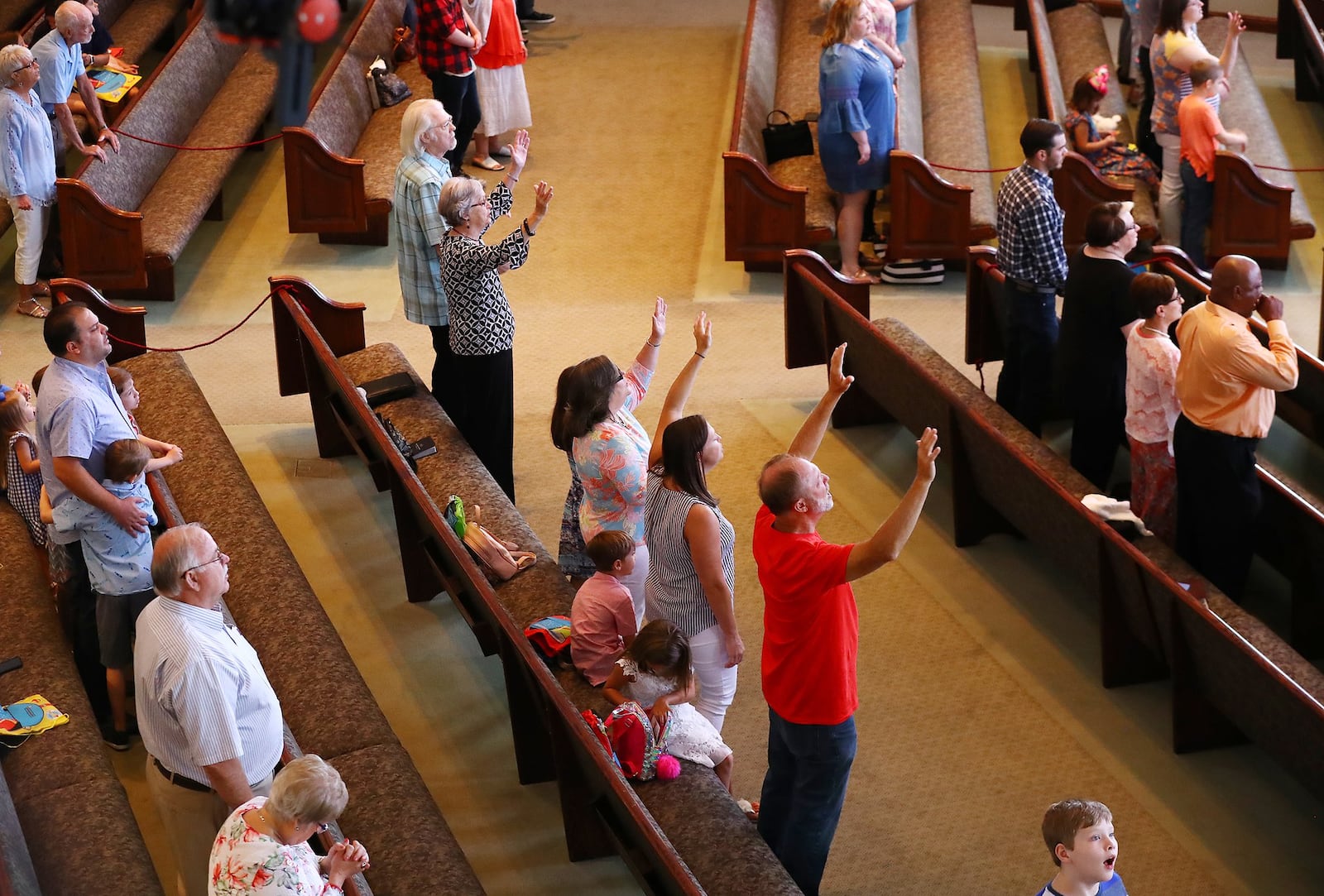 Worshippers keep their distance at the Church at Liberty Square in Cartersville, which resumed Sunday services on Sunday, June 7, 2020, for the first time since closing its doors in March after suffering from a deadly outbreak of the coronavirus disease. (Photo: Curtis Compton / ccompton@ajc.com)