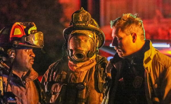 Crews extinguished a blaze that damaged the first floor of a home Friday in northeast Atlanta. JOHN SPINK / JSPINK@AJC.COM