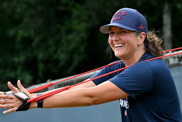 U.S. Women's closing pitcher Meggie Meidlinger stretches at Wheeler High School’s baseball field on June 19, 2024 in Marietta. (Hyosub Shin / AJC)