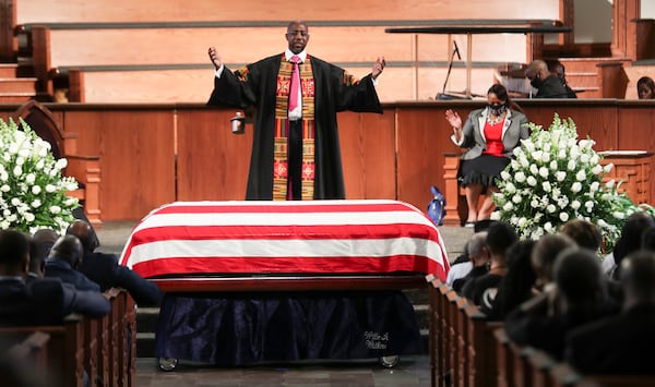 The Rev. Raphael Warnock offers a benediction to close the 2020 funeral services of John Lewis, who was a long-time member of  Ebenezer Baptist Church in Atlanta. Alyssa Pointer / alyssa.pointer@ajc.com