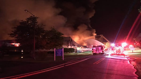 Superior Plastics caught on fire about 8:30 p.m. Thursday, Carrollton police said. The fire raged for at least three hours, gutting the building and collapsing the roof. (Credit: Channel 2 Action News)