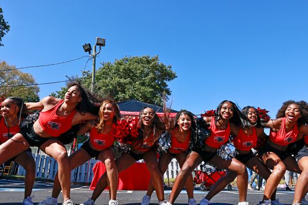 Clark Atlanta University cheerleaders do the “swag surf” dance during a homecoming pep rally on Friday, October 14, 2022. (Natrice Miller/natrice.miller@ajc.com)  