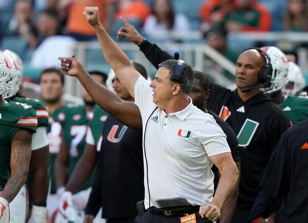 Miami head coach Mario Cristobal reacts after a play during the second half of an NCAA college football game against Wake Forest, Saturday, Nov. 23, 2024, in Miami Gardens, Fla. (AP Photo/Lynne Sladky)