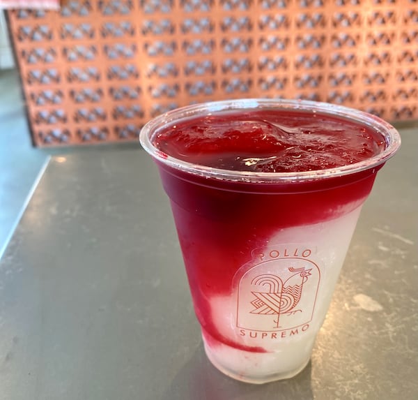 Pollo Supremo’s sweet-tangy frozen margarita is drizzled with vivid red hibiscus syrup and sells for $8. Wendell Brock for The Atlanta Journal-Constitution