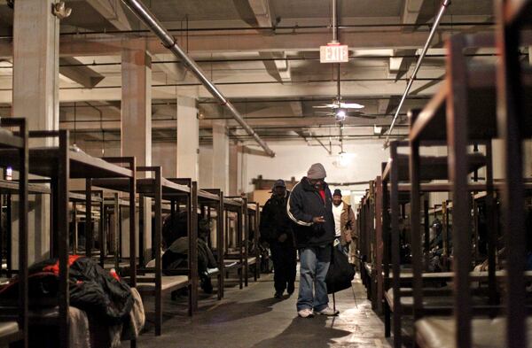 Room No. 1, where around 400 bunk beds fill every night at the homeless shelter in Atlanta at the intersection of Peachtree Street and Pine Street. One cold December night in 2011, with temperatures in the low 30s, Room No. 1 quickly filled up with over 600 men. (Jason Getz / jgetz@ajc.com)