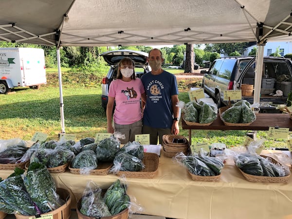 Cotton Mill Farmers Market requires masks for vendors like Wendy Crager and Bryan Hager of Crager Hager Farm and produce is packaged for no touch sales.
Courtesy of Wendy Crager