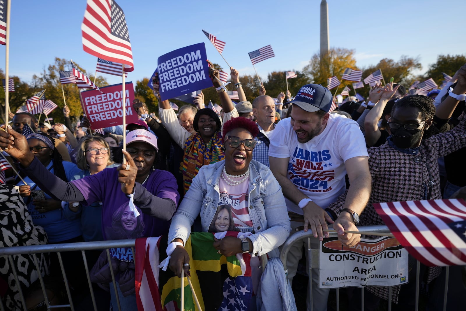 Supporters of Democratic presidential nominee Vice President Kamala Harris arrive to attend a campaign rally in Washington, Tuesday, Oct. 29, 2024. (AP Photo/Ben Curtis)