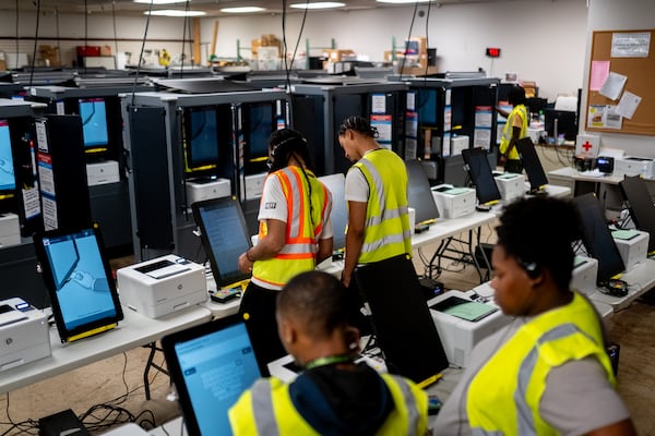 Dekalb County Elections officals conduct logic and accuracy testing of Dominion voting machines.  Monday, Sept. 16, 2024 (Ben Hendren for the Atlanta Journal-Constitution)