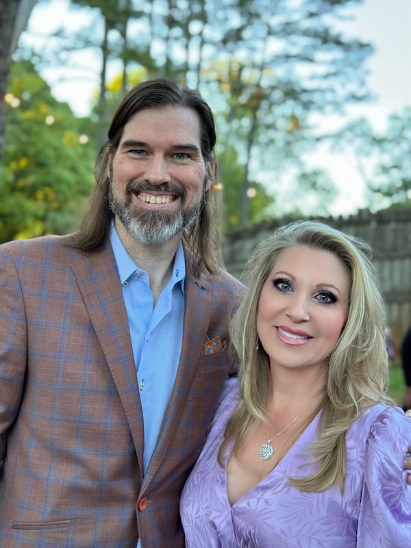 Shawn Arnold (left) grew up primarily in Cartersville as a Southern Baptist. Holly Firfer Arnold (right) is Jewish. The couple celebrates Chrismukkah.