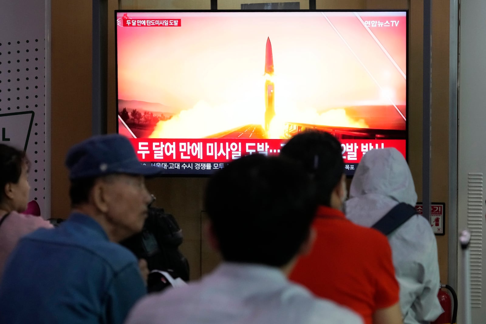 A TV screen shows a file image of North Korea's missile launch during a news program at Seoul Railway Station in Seoul, South Korea, Thursday, Sept. 12, 2024. (AP Photo/Ahn Young-joon)