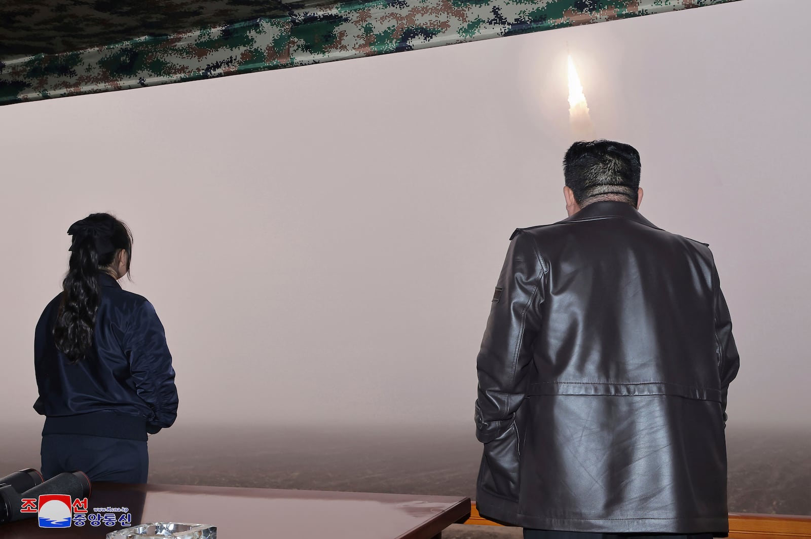 In his photo provided by the North Korean government, North Korean leader Kim Jong Un, right, and his daughter observe what it says a test launch of new intercontinental ballistic missile "Hwasong-19" at an undisclosed place in North Korea Thursday, Oct. 31, 2024. Independent journalists were not given access to cover the event depicted in this image distributed by the North Korean government. The content of this image is as provided and cannot be independently verified. Korean language watermark on image as provided by source reads: "KCNA" which is the abbreviation for Korean Central News Agency. (Korean Central News Agency/Korea News Service via AP)