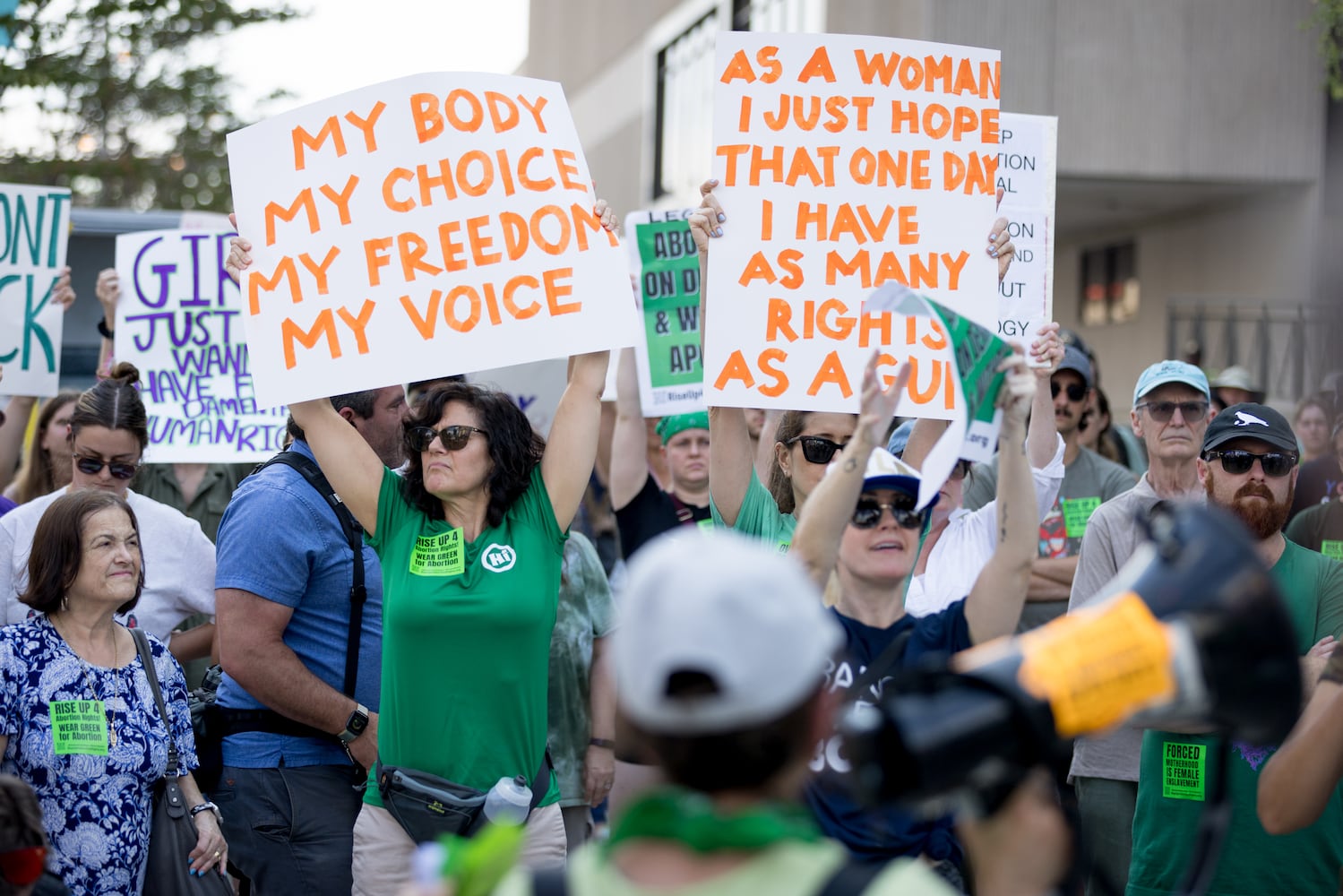 Abortion rights activists rally at Centennial Olympic Park in Atlanta on Friday, June 24, 2022. The protest follows the Supreme Court’s overturning of Roe v Wade. (Arvin Temkar / arvin.temkar@ajc.com)