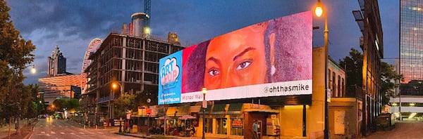 One of Michael Walls ArtPop’s billboards is near Centennial Park. 
Courtesy of Mark Alberhasky.