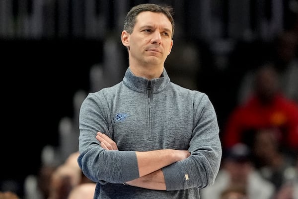 Oklahoma City Thunder head coach Mark Daigneault watches play against the Atlanta Hawks during the first half of an NBA basketball game, Friday, Feb. 28, 2025, in Atlanta. (AP Photo/Mike Stewart)