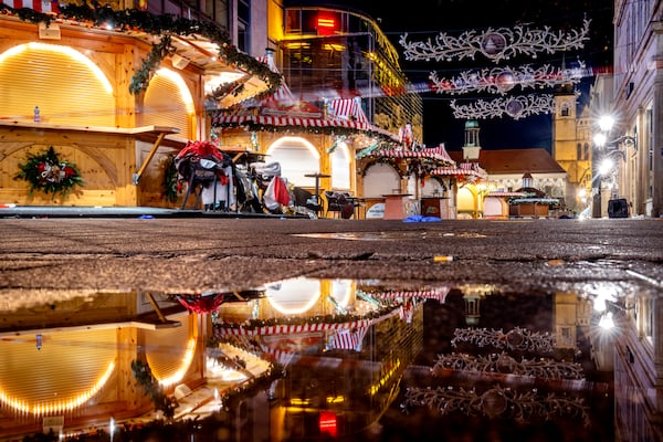 The Christmas market, where a car drove into a crowd on Friday evening, in Magdeburg, Germany, is empty on Sunday morning , Dec. 22, 2024. (AP Photo/Michael Probst)