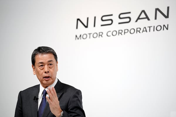 Nissan Chief Executive Makoto Uchida speaks during a joint news conference in Tokyo, Japan, Monday, Dec. 23, 2024. (AP Photo/Eugene Hoshiko)