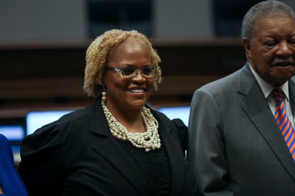 Khadijah Abdur-Rahman poses for a photo at a ribbon cutting celebrating the new assembly hall and renovations at the Fulton County government building in Atlanta, Georgia, on Wednesday, May 5, 2021. (Rebecca Wright for the Atlanta Journal-Constitution)