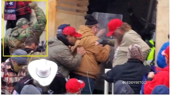 Michael Bradley of Forsyth (pictured in the yellow box) was convicted of assaulting police during a melee at an entry tunnel on the Lower West Terrace of the U.S. Capitol on Jan. 6, 2021. He was sentenced to 60 months in prison prior to President Donald Trump's pardons. (U.S. Department of Justice)