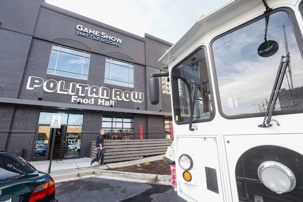 The Rediscover Dunwoody Trolley Tour visits the Politan Row food hall in Dunwoody Village. (Natrice Miller/AJC)