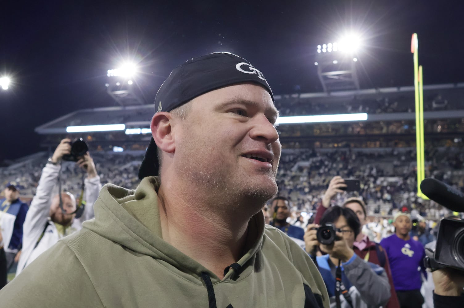 Georgia Tech Yellow Jackets head coach Brent Key celebrates after Tech won an NCAA college football game between Georgia Tech and Syracuse, 31-22, in Atlanta on Saturday, Nov. 18, 2023.  (Bob Andres for the Atlanta Journal Constitution)