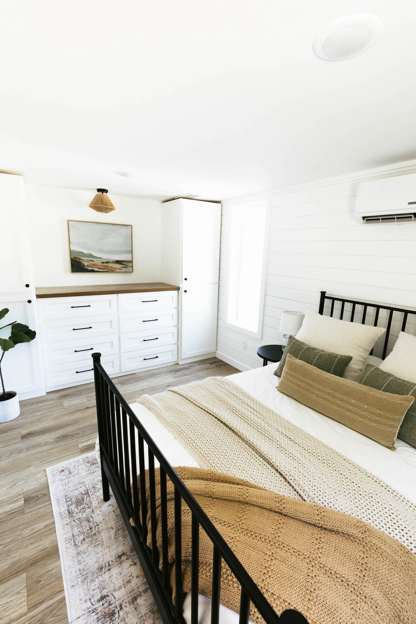 Built-ins are a great way to keep clutter contained in a smaller home. Photo: Courtesy of Mustard Seed Tiny Homes