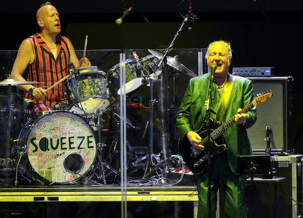 Squeeze performed at Ameris Amphitheatre in Alpharetta on Friday, Sept. 24, 2021. Pictured: Drummer Simon Hanson (left) and Glenn Tillbrook. (Photo: Robb Cohen for The Atlanta Journal-Constitution)