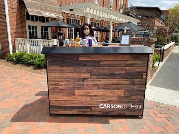 Carson Kitchen's new bar cart serves a variety of to-go drinks for sipping while strolling around Alpharetta City Center. Courtesy of Carson Kitchen