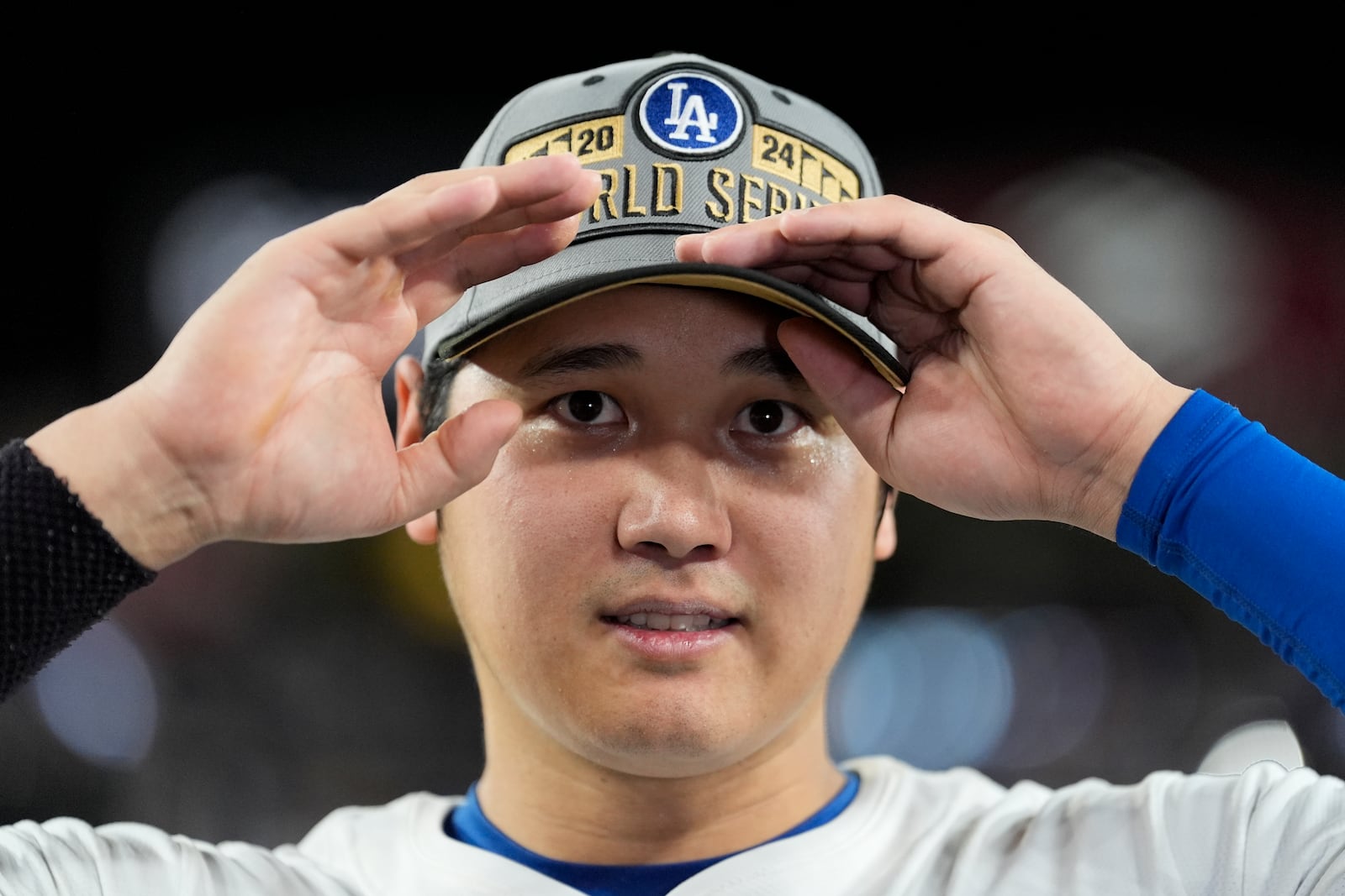 Los Angeles Dodgers' Shohei Ohtani celebrates their win against the New York Mets in Game 6 of a baseball NL Championship Series, Sunday, Oct. 20, 2024, in Los Angeles. The Dodgers will face the New York Yankees in the World Series. (AP Photo/Ashley Landis)