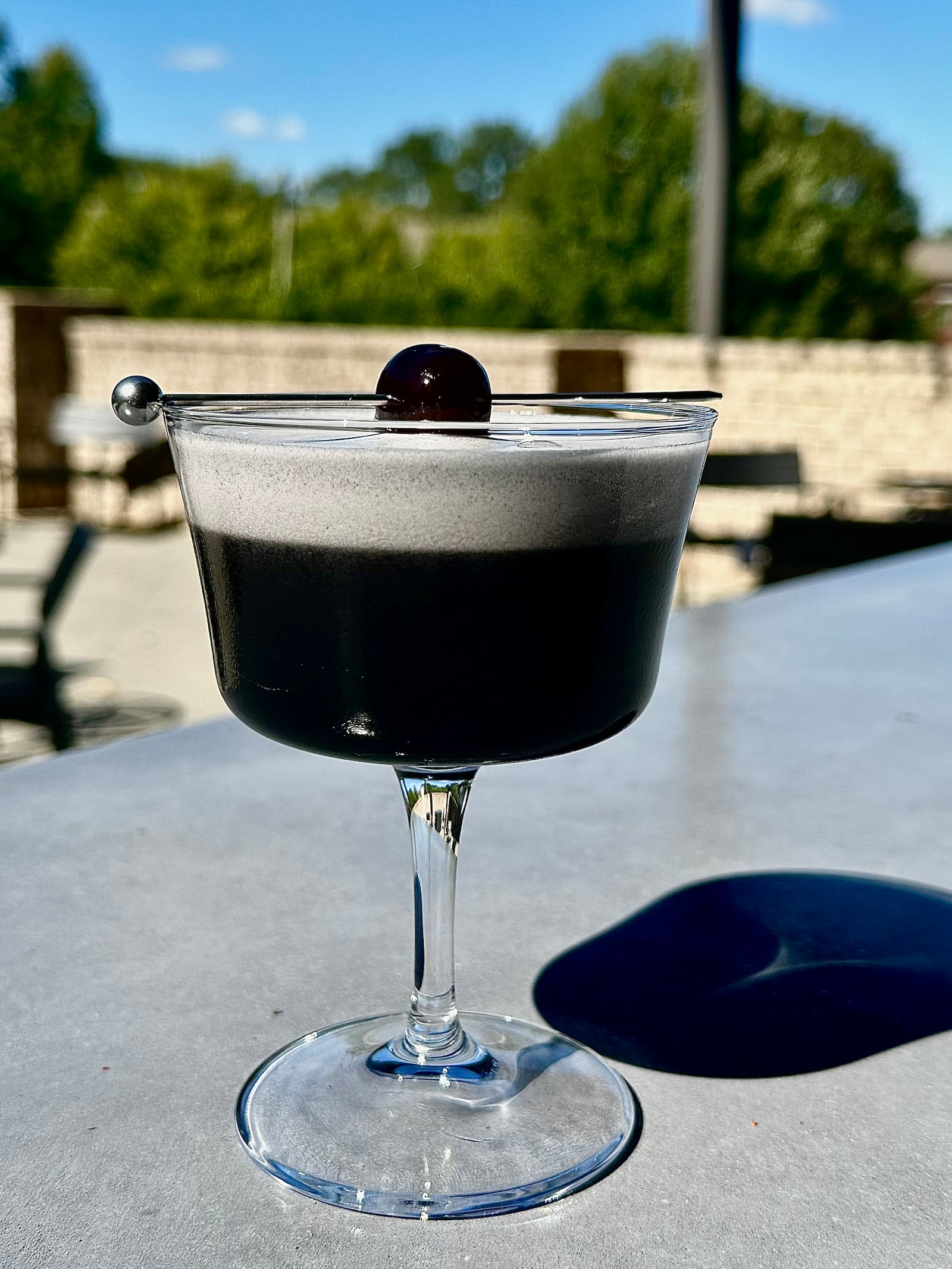 Foundation Social Eatery's Grim Reaper's Robe looks dark and mysterious, but it's a mezcal sour in disguise.
(Courtesy of Foundation Social Eatery)