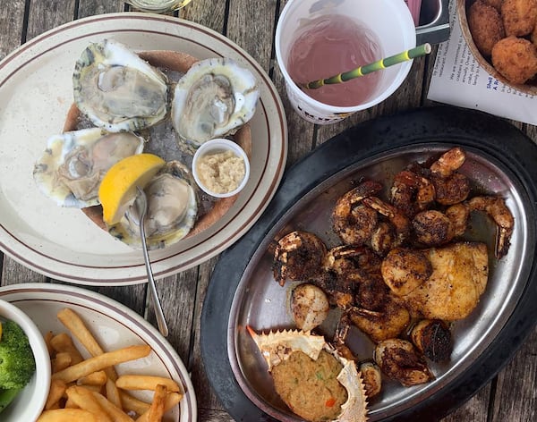 Dishes served by Seafood House on the Docks, which hosts a Pig Pickin’ and Oyster Roast at the Coastal Discovery Museum during the Hilton Head Island Seafood Festival.  (Lana Ferguson/Island Packet/TNS)